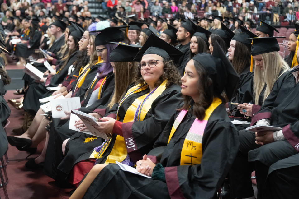 A graduate looks into the crowd at the WT commencement ceremony Saturday morning at the First United Bank Center in Canyon.