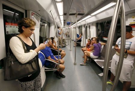 Barcelona's mayor Ada Colau travels by underground in Barcelona, Spain, July 29, 2015. REUTERS/Albert Gea