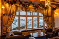 <p>This gorgeous hotel close to Snowdonia and overlooking Lake Efyrnwy offers a dream-like Christmas in Wales. <a href="https://www.booking.com/hotel/gb/lakevyrnwy.en-gb.html?aid=1922306&label=christmas-hotels" rel="nofollow noopener" target="_blank" data-ylk="slk:Lake Vyrnwy Hotel & Spa;elm:context_link;itc:0;sec:content-canvas" class="link ">Lake Vyrnwy Hotel & Spa</a> is a charming hotel within the 24,000 acre Vyrnwy Nature Reserve. If you're looking to escape to a peaceful location for your Christmas break, this is the place to book. Arrive on Christmas Eve and you'll enjoy afternoon tea and a champagne cocktail before dinner in the lovely Tower Restaurant. There's also traditional Christmas Day lunch, Christmas cake served and a festive buffet in the evening. On Boxing Day, you can enjoy the spa and country pursuits, as well as more sumptuous dining.</p><p><a class="link " href="https://www.booking.com/hotel/gb/lakevyrnwy.en-gb.html?aid=1922306&label=christmas-hotels" rel="nofollow noopener" target="_blank" data-ylk="slk:CHECK AVAILABILITY;elm:context_link;itc:0;sec:content-canvas">CHECK AVAILABILITY</a></p>