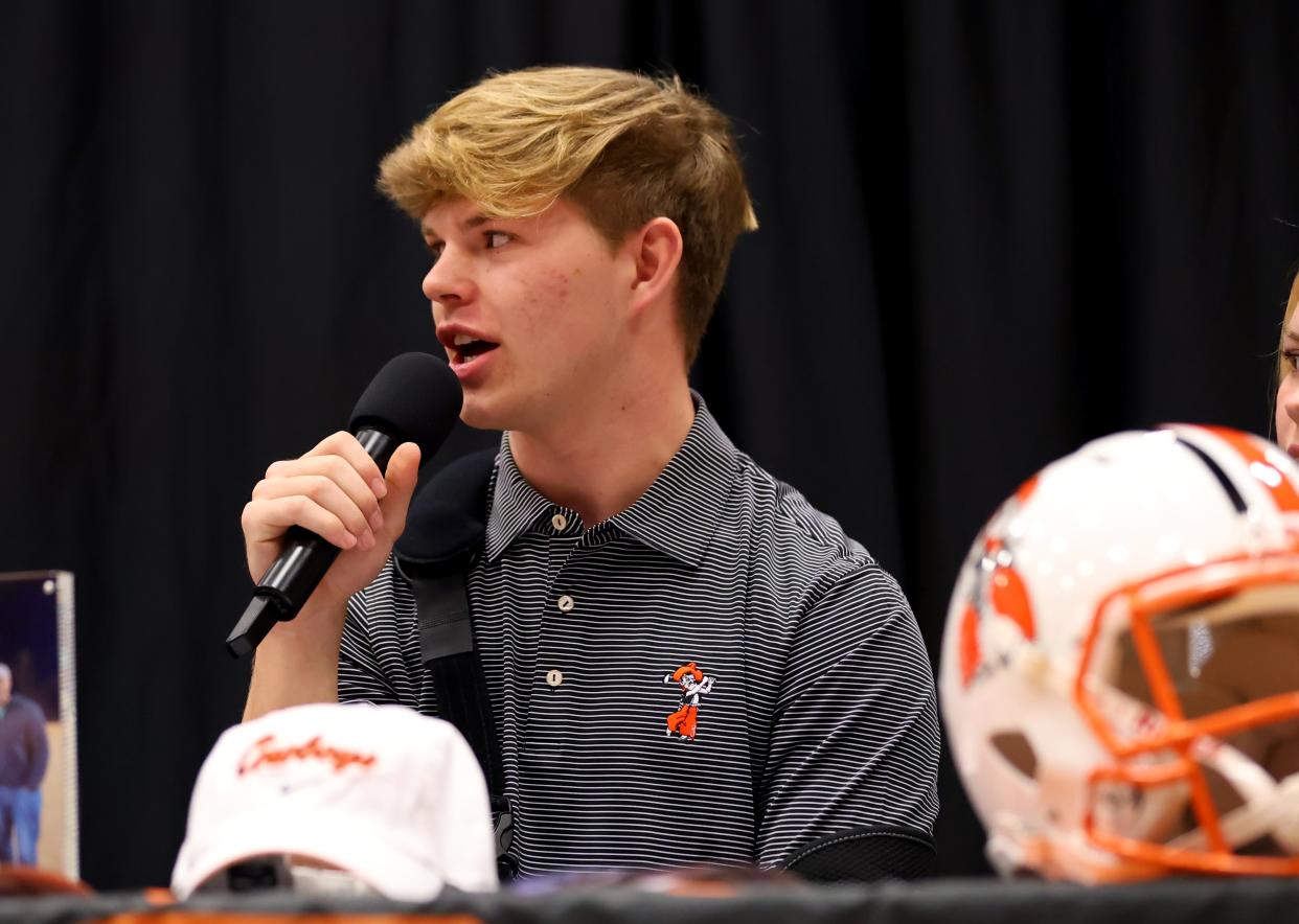 OCS' Garret Wilson speaks before singing with Oklahoma State University as a PWO during a signing day ceremony at Oklahoma Christian School in Edmond, Okla., Wednesday, Feb. 7, 2024.