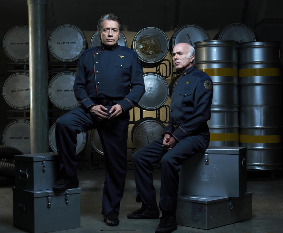 BATTLESTAR GALACTICA -- Season 3 -- Pictured: Edward James Olmos as Admiral William Adama, Michael Hogan as Colonel Saul Tigh -- (Photo by: Justin Stephens/Syfy/NBCU Photo Bank/NBCUniversal via Getty Images)