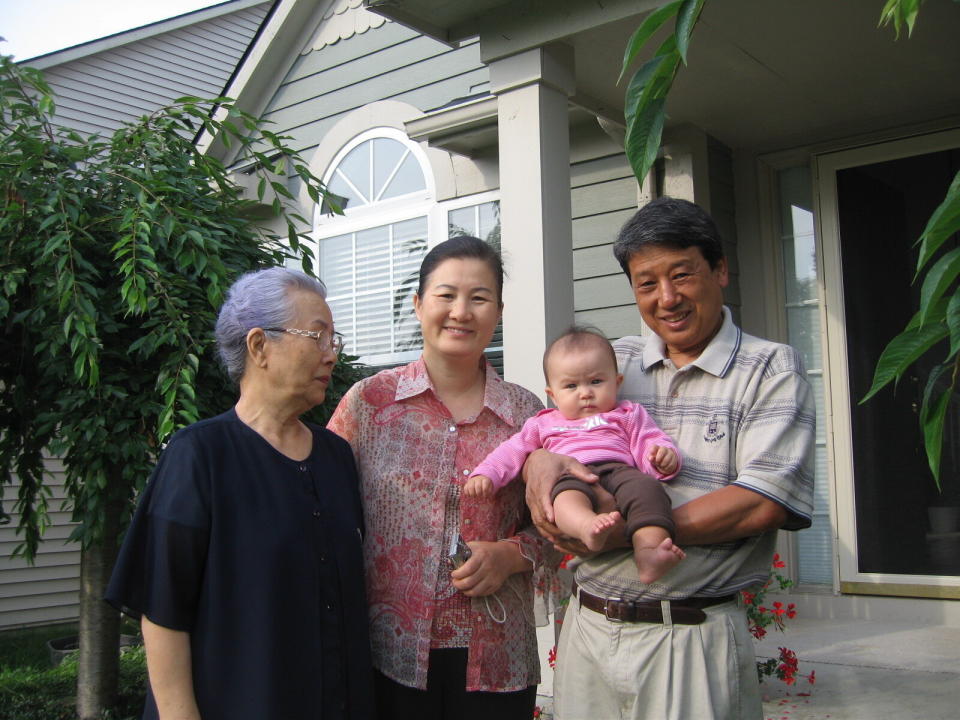 Stanton Lee's daughter, Madigan, with great-grandmother Myung Namm (left), grandmother Mi Ja Lee (center) and grandfather Jai Ho Lee in 2008. (Photo: Courtesy of Kendra Stanton Lee)