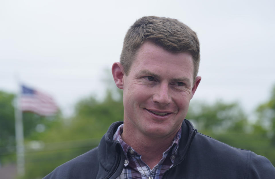 Texas congressional candidate Michael Wood smiles Tuesday, April 27, 2021, in Arlington, Texas. Wood is considered the anti-Trump Republican Texas congressional candidate that Illinois Congressman Adam Kinzinger has endorsed in the May 1st special election for the 6th Congressional District. (AP Photo/LM Otero)