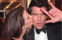 <b>Tomorrow Never Dies – 1997</b><br><br> Pierce Brosnan is clearly enjoying himself at the 1997 ‘Tomorrow Never Dies’ with girlfriend Keely Shaye Smith. <br><br> (Copyright: REX)