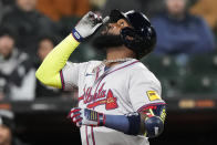Atlanta Braves' Marcell Ozuna celebrates as he rounds the bases after hitting a solo home run during the ninth inning of a baseball game against the Chicago White Sox in Chicago, Tuesday, April 2, 2024. (AP Photo/Nam Y. Huh)