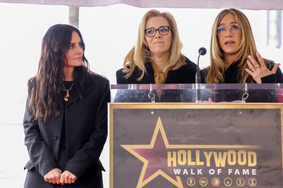 <p>Actors Jennifer Aniston and Lisa Kudrow speak during Courteney Cox's star unveiling ceremony on the Hollywood Walk of Fame in Los Angeles, California, U.S., February 27, 2023. REUTERS/Mario Anzuoni</p> 