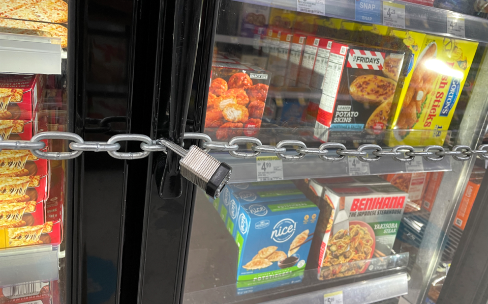 A chain with padlocks secures freezer doors at a Walgreens store on July 18, 2023 in San Francisco, California. A San Francisco Walgreens store has locked its freezers with chains and padlocks to thwart shoplifters that have been hitting the store on a regular basis and stealing frozen pizzas and ice cream.