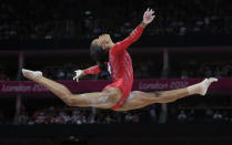 U.S. gymnast Gabrielle Douglas performs on the balance beam during the Artistic Gymnastics women's team final at the 2012 Summer Olympics, Tuesday, July 31, 2012, in London. (AP Photo/Julie Jacobson)