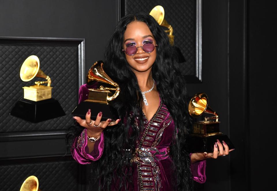 March 14, 2021; Los Angeles, CA, USA; H.E.R., winner of the Best R&B Song award for â€˜Better Than I Imaginedâ€™ and the Song of the Year award for 'I Can't Breathe,â€™ poses in the media room during the 63rd annual GRAMMY Awards on March 14, 2021 at the STAPLES Center in Los Angeles, Calif. Mandatory Credit: Kevin Winter/Getty Images for The Recording Academy via USA TODAY NETWORK