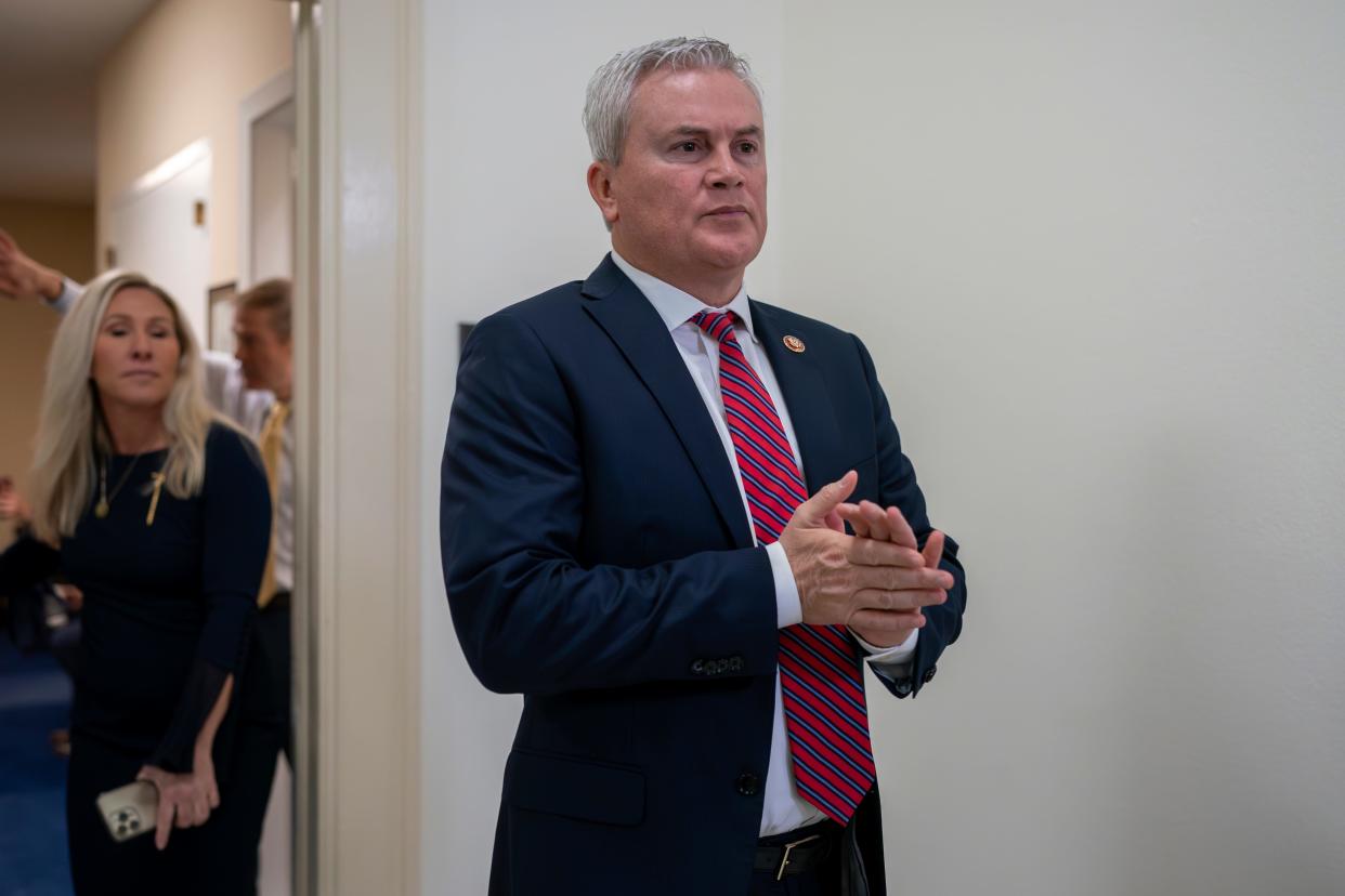 House Oversight and Accountability Committee Chairman James Comer, R-Ky., Rep. Marjorie Taylor Greene, R-Ga., background, after Hunter Biden, President Joe Biden's son, defied a congressional subpoena to appear privately for a deposition, at the Capitol, Dec. 13, 2023.