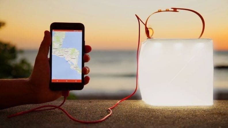 Charge up this lantern in the sun, then use it to charge your phone.