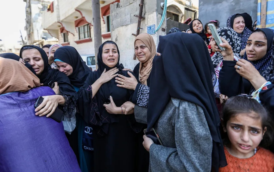 Israeli citizens in Rafah embrace in tears