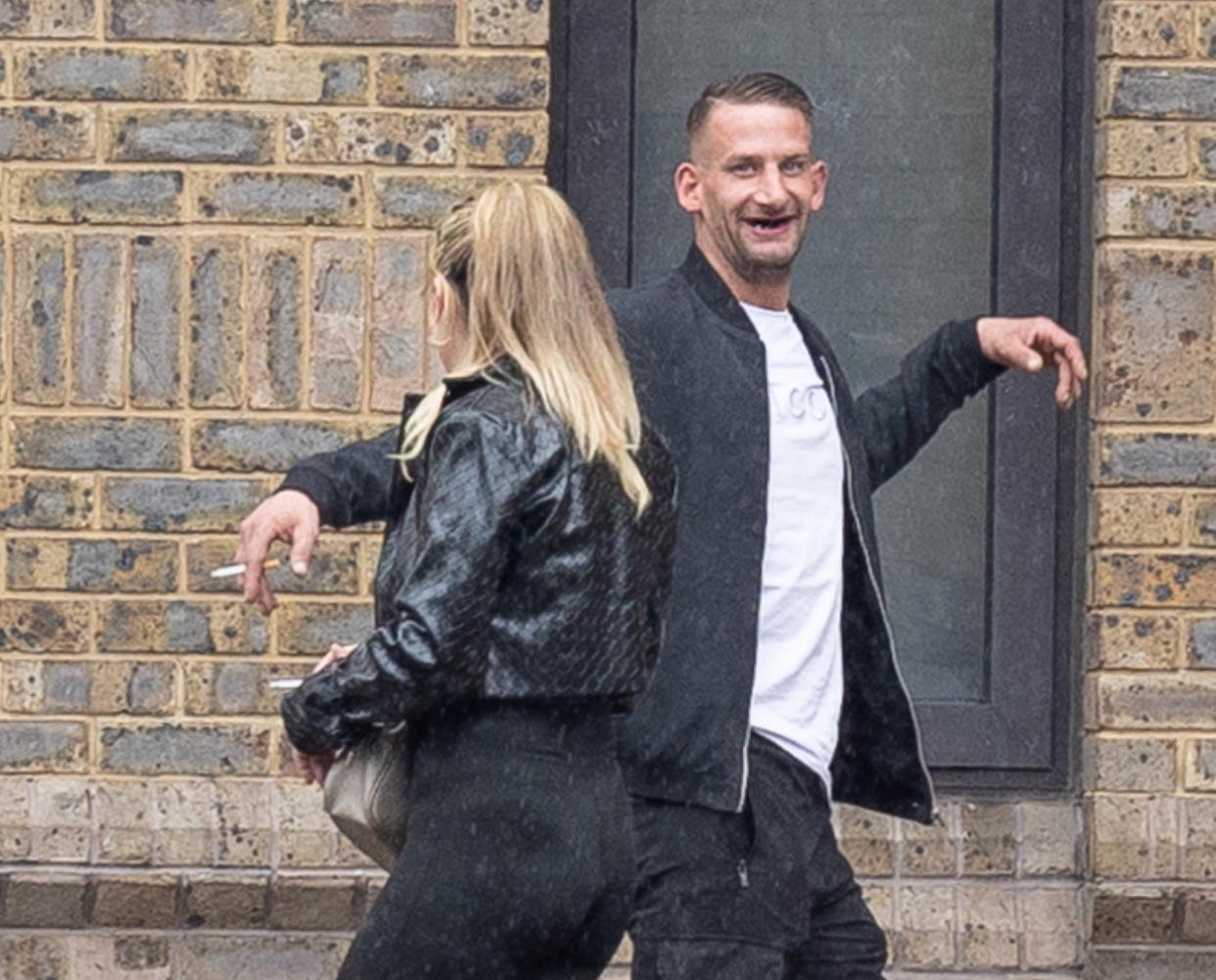 Sophie Sutton and Jonathan Meredith re dancing outside court before being convicted of a violent attack on a policeman. (Cavendish)