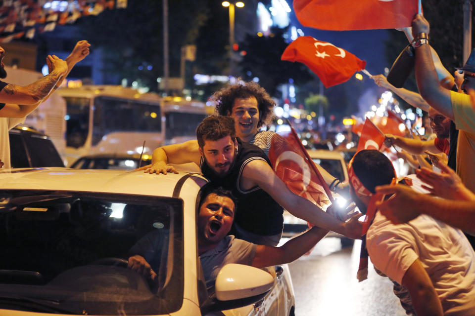 Supporters of Ekrem Imamoglu, the candidate of the secular opposition Republican People's Party, CHP, celebrate in central Istanbul, Sunday, June 23, 2019. In a blow to Turkish President Recep Tayyip Erdogan, Imamoglu declared victory in the Istanbul mayor's race for a second time Sunday after Binali Yildirim, the government-backed candidate conceded defeat in a high-stakes repeat election. (AP Photo/Lefteris Pitarakis)