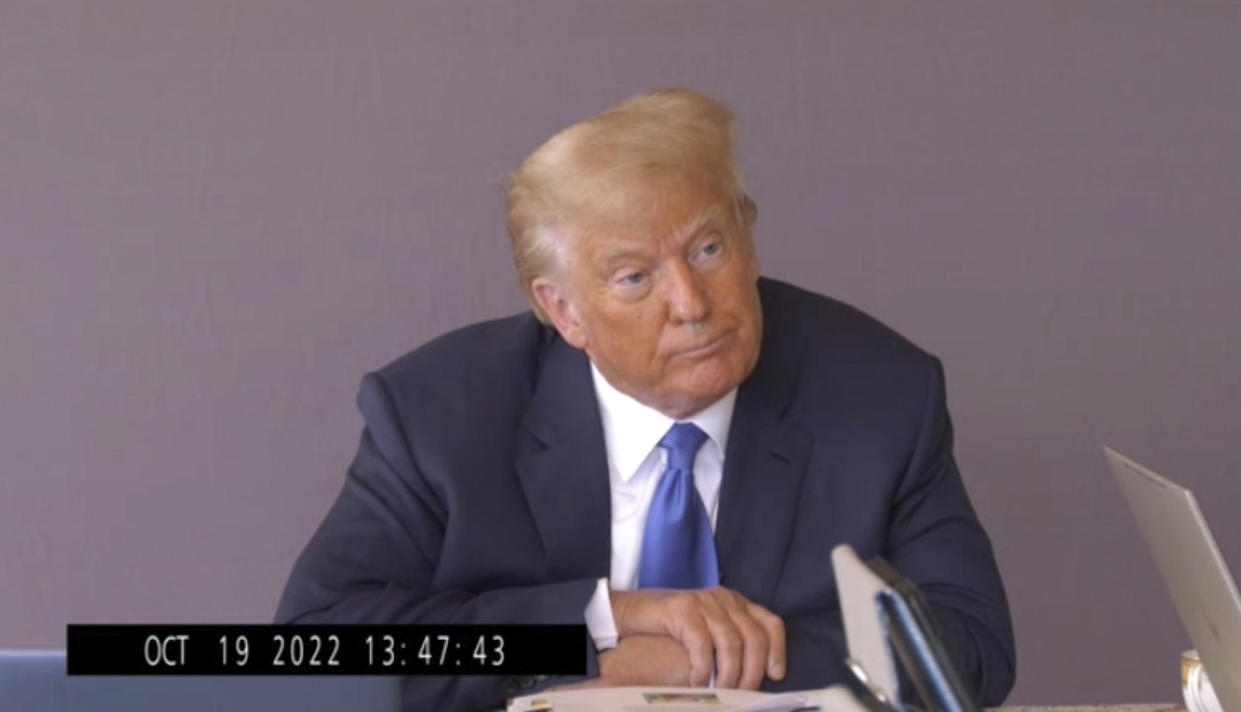 In this image taken from video released by Kaplan Hecker & Fink, former President Donald pauses during his Oct. 19, 2022, deposition for his trial against writer E. Jean Carroll. The video recording of Trump being questioned about the rape allegations against him was made public for the first time Friday, May 5, 2023, providing a glimpse of the Republican's emphatic, often colorful denials. (Kaplan Hecker & Fink via AP)