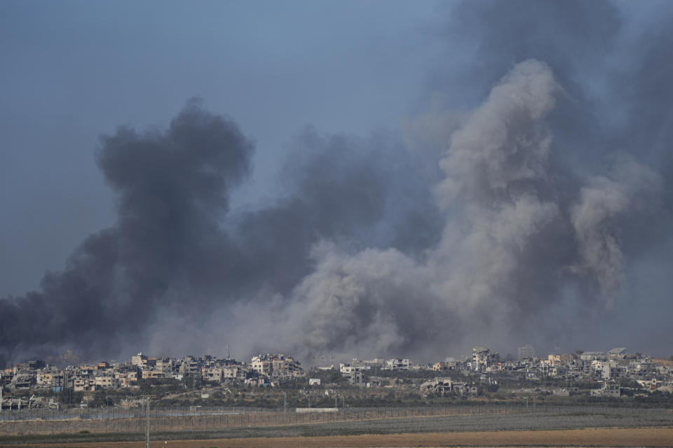 Smoke rises following an Israeli bombardment in the Gaza Strip, as seen from southern Israel on Monday, Dec. 11, 2023. The army is battling Palestinian militants across Gaza in the war ignited by Hamas' Oct. 7 attack into Israel. (AP Photo/Ohad Zwigenberg)