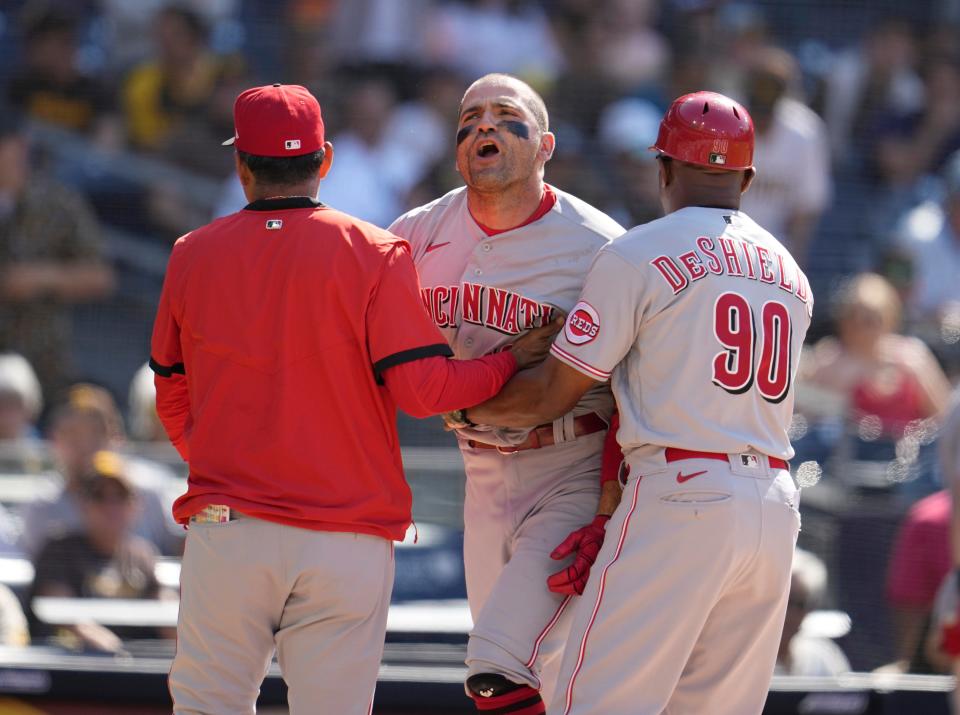The Reds' Joey Votto argues a called third strike during the first inning against the Padres at Petco Park on Saturday.