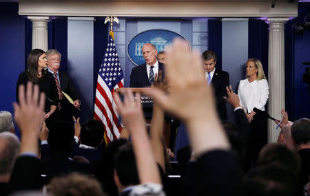 White House Press Secretary Sarah Huckabee Sanders, National Security Advisor John Bolton, U.S. Director of National Intelligence Dan Coats, National Security Agency (NSA) Director General Paul Nakasone, FBI Director Christopher Wray and Department of Homeland Security (DHS) Secretary Kirstjen Nielsen hold a briefing on election security in the White House press briefing room at the White House in Washington, U.S., August 2, 2018. REUTERS/Carlos Barria