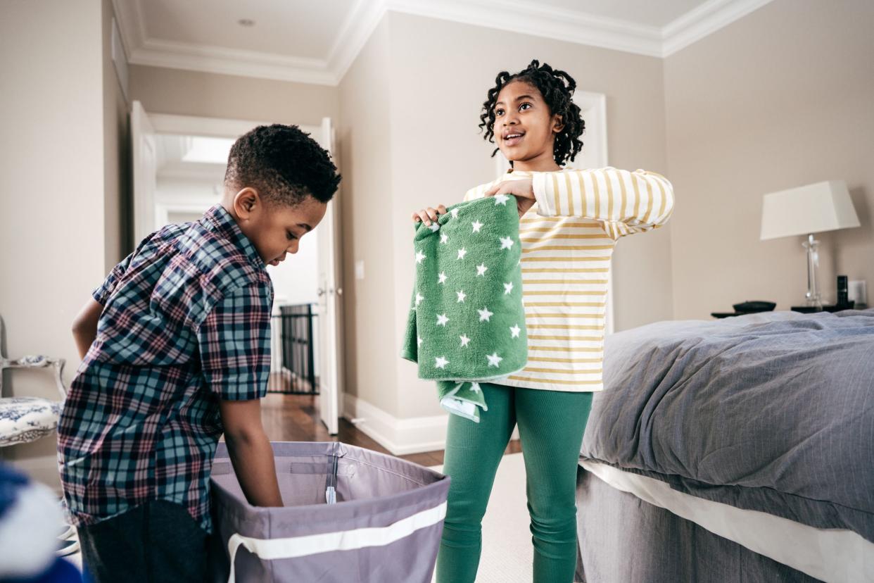 children doing laundry