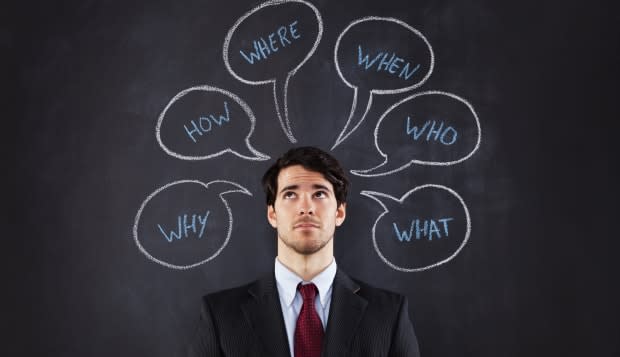 Businessman questions about life draw on the blackboard