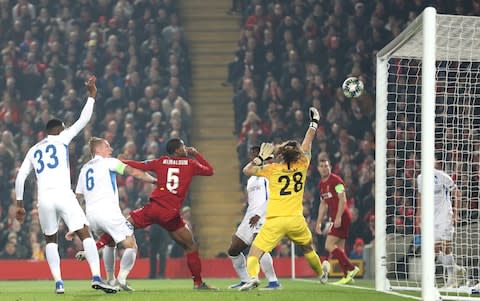 Georginio Wijnaldum of Liverpool scores his team's first goal during the UEFA Champions League group E match between Liverpool FC and KRC Genk  - Credit: &nbsp;Alex Pantling/Getty Images