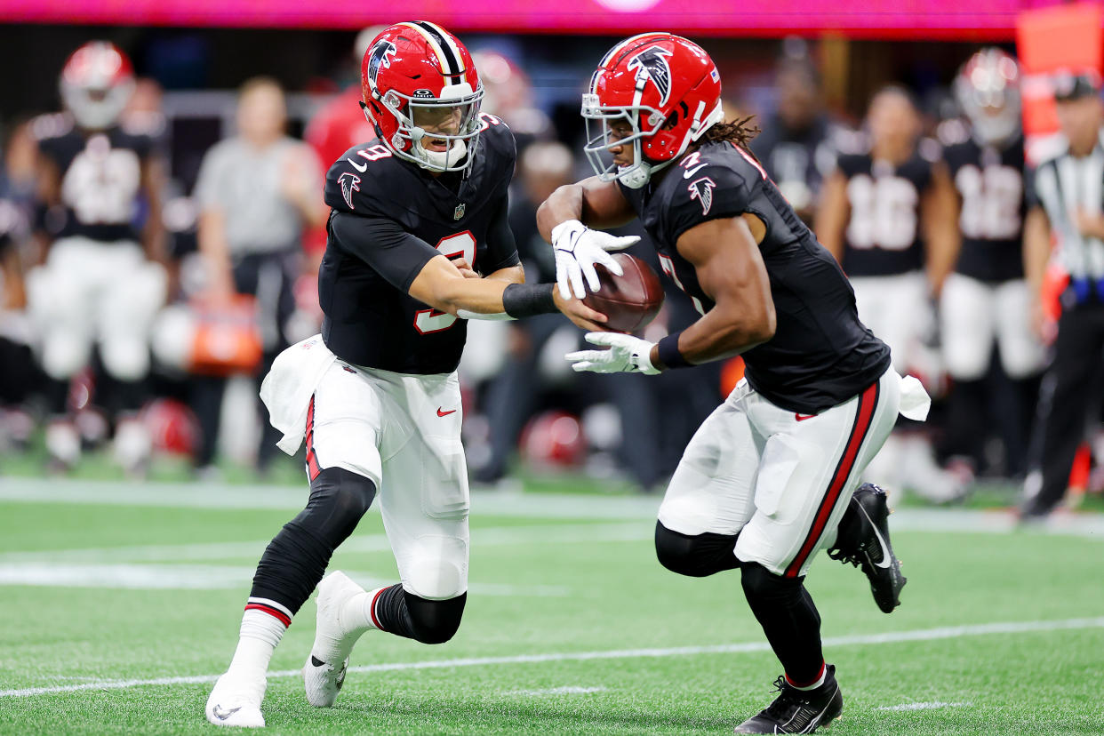 Desmond Ridder and Bijan Robinson are keying a revival in Atlanta. (Kevin C. Cox/Getty Images)