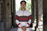 Shepard Thomas, a recent Georgetown University graduate and a descendant of slaves sold by Jesuits to keep the school open, poses for a portrait on the campus in Washington on Thursday, May 6, 2021. One of the main concerns is how funds committed to reparations work will be spent, and whether slave descendants will have adequate say in the process, according to Thomas. “The fear is that the university will use these funds for their own purposes,” the 23-year-old New Orleans native said. “The university is trying to control the narrative, and we’re trying to prevent that.” (AP Photo/Jacquelyn Martin)