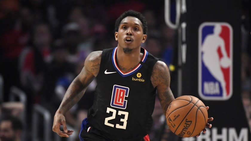 Los Angeles Clippers guard Lou Williams dribbles during the second half of an NBA basketball game against the Denver Nuggets Friday, Feb. 28, 2020, in Los Angeles. The Clippers won 132-103. (AP Photo/Mark J. Terrill)