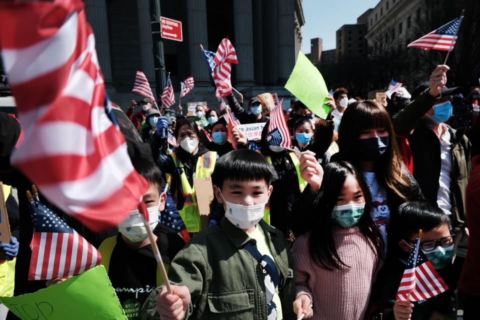 Children joined a protest against anti-Asian violence on April 04, 2021, in New York City. Nearly 3,000 demonstrators, including activists, residents and local politicians, marched across the Brooklyn Bridge.