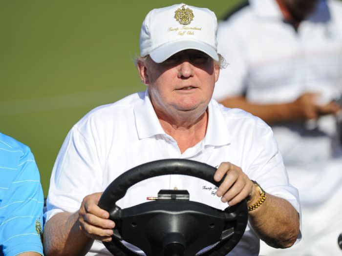 Photo of Donald Trump Driving a Golf Cart