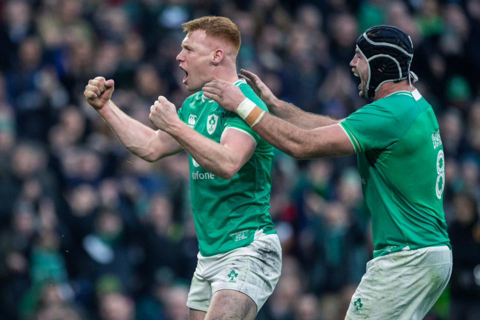 DUBLIN, IRELAND:  February 24:   Ciaran Frawley #15 of Ireland celebrates after scoring a try as Caelan Doris #8 of Ireland congratulates him during the Ireland V Wales, Six Nations rugby union match at Aviva Stadium on February 24, 2024, in Dublin, Ireland. (Photo by Tim Clayton/Corbis via Getty Images)