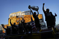 FILE - Vegas Golden Knights defenseman Nicolas Hague celebrates with the Stanley Cup during a parade along the Las Vegas Strip for the NHL hockey champions Saturday, June 17, 2023, in Las Vegas. The Vegas Golden Knights are looking to become the first Stanley Cup champions to repeat since the Pittsburgh Penguins in 2016 and '17. (AP Photo/John Locher, File)