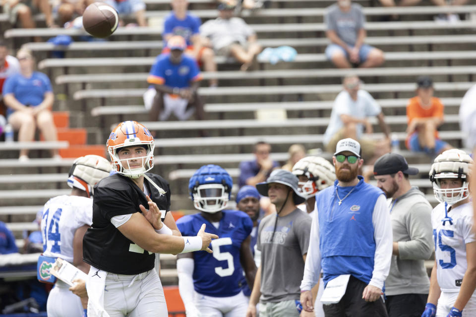 Florida quarterback Graham Mertz (15) throws a pass during NCAA college football practice at Ben Hill Griffin Stadium in Gainesville, Fla., Saturday, Aug. 5, 2023. (Willie J. Allen Jr./Orlando Sentinel via AP)