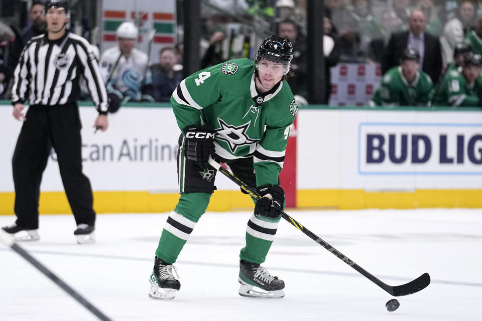 Dallas Stars defenseman Miro Heiskanen prepares to take a shot that would score in the first period of an NHL hockey game against the Seattle Kraken, Tuesday, March 21, 2023, in Dallas. (AP Photo/Tony Gutierrez)