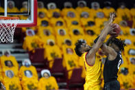 Michigan State forward Aaron Henry, right, goes up for a shot against Maryland forward Donta Scott during the second half of an NCAA college basketball game, Sunday, Feb. 28, 2021, in College Park, Md. Maryland won 73-55. (AP Photo/Julio Cortez)