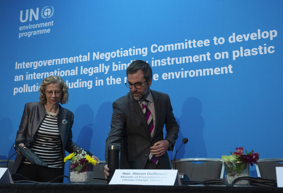 FILE - United Nations Environment Programme Executive Director Inger Andersen and Environment and Climate Change Minister Steven Guilbeault take their seats at a news conference April 23, 2024 in Ottawa, Ontario. (Adrian Wyld/The Canadian Press via AP, File)