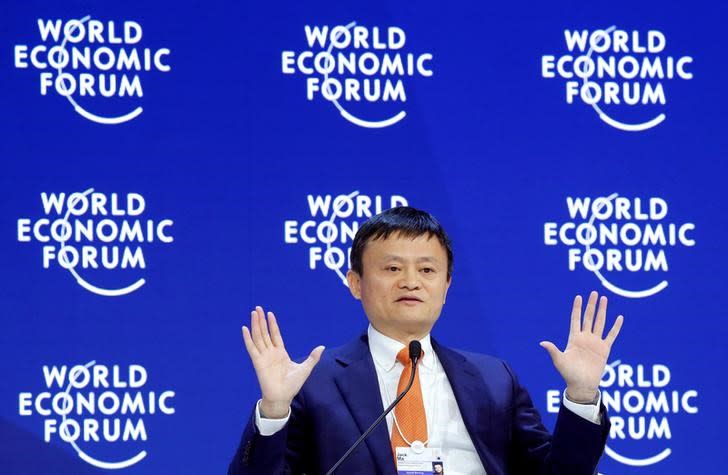 FILE PHOTO – Jack Ma, Executive Chairman of Alibaba Group Holding, gestures as he speaks the World Economic Forum (WEF) annual meeting in Davos, Switzerland January 24, 2018. REUTERS/Denis Balibouse