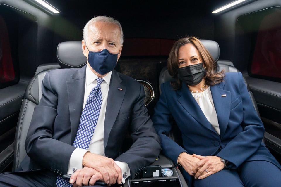 President Joe Biden and Vice President Kamala Harris ride in The Beast