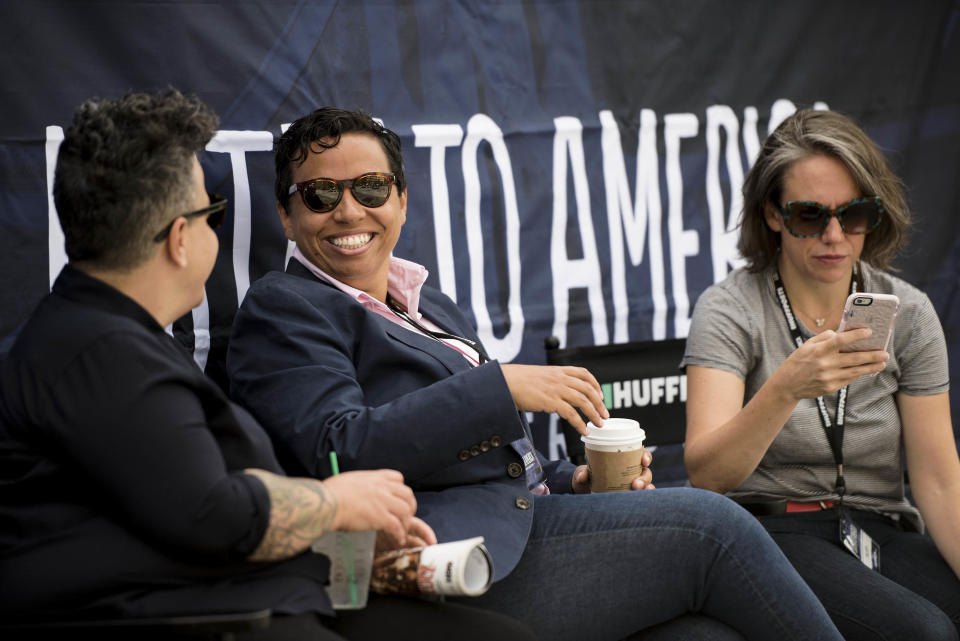 HuffPost Editor-in-Chief Lydia Polgreen with her wife, Candy Feit, left, and strategy director Hillary Frey talk before the "Listen to America: A HuffPost Road Trip" kickoff event.