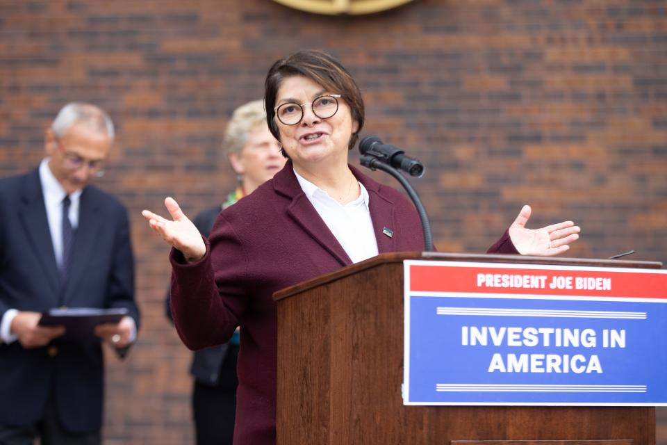 Denise Maes, regional administrator for the U.S. General Services Administration's Rocky Mountain Region, opens up Monday's press conference in front of the Frank Carlson Federal Building and Courthouse.