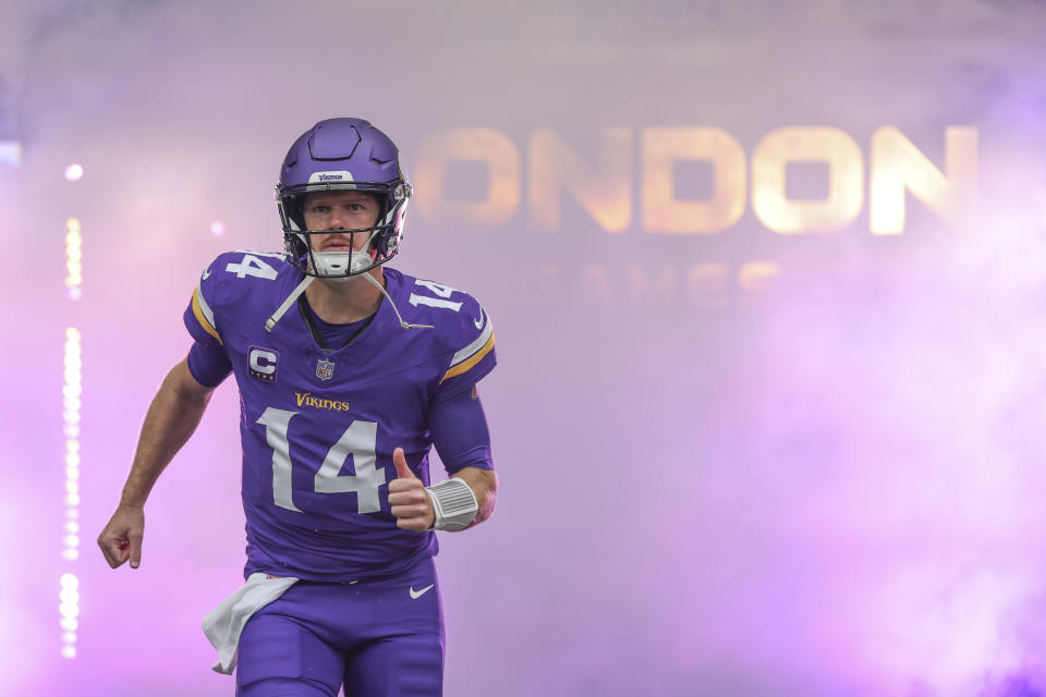 Minnesota Vikings quarterback Sam Darnold is introduced before an NFL football game against the New York Jets, Sunday, Oct. 6, 2024, at the Tottenham Hotspur stadium in London. (AP Photo/Ian Walton)