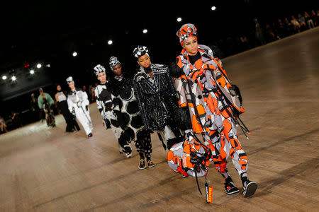 Models present creations from Marc Jacobs SS 2018 collection during New York Fashion Week in New York City, U.S. September 13, 2017. REUTERS/Eduardo Munoz