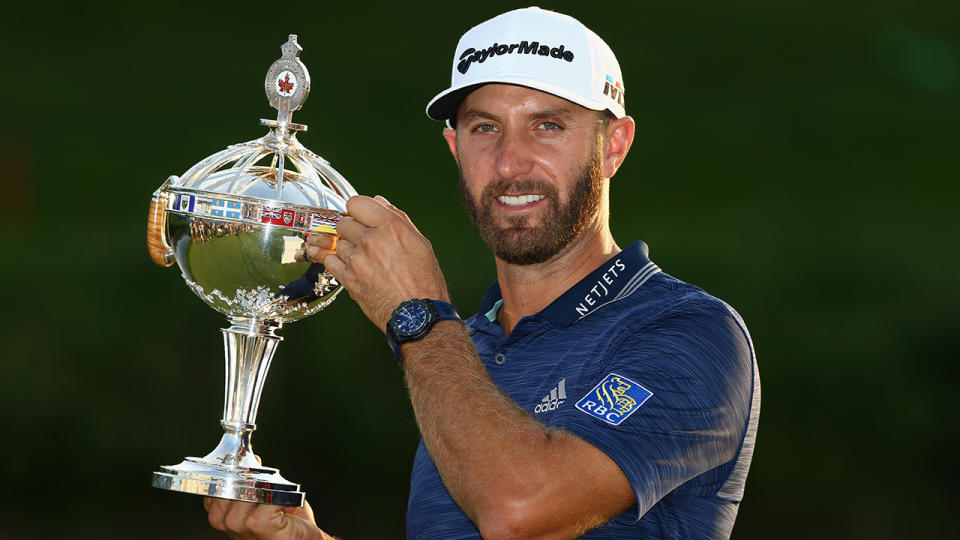 Dustin Johnson poses with the trophy during the final round at the RBC Canadian Open at Glen Abbey Golf Club on July 29, 2018 in Oakville, Canada. (Photo by Vaughn Ridley/Getty Images)