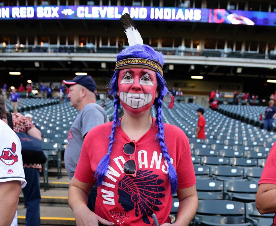 An Indians fan in redface at Game 1 of the ALDS against the Red Sox. (AP)