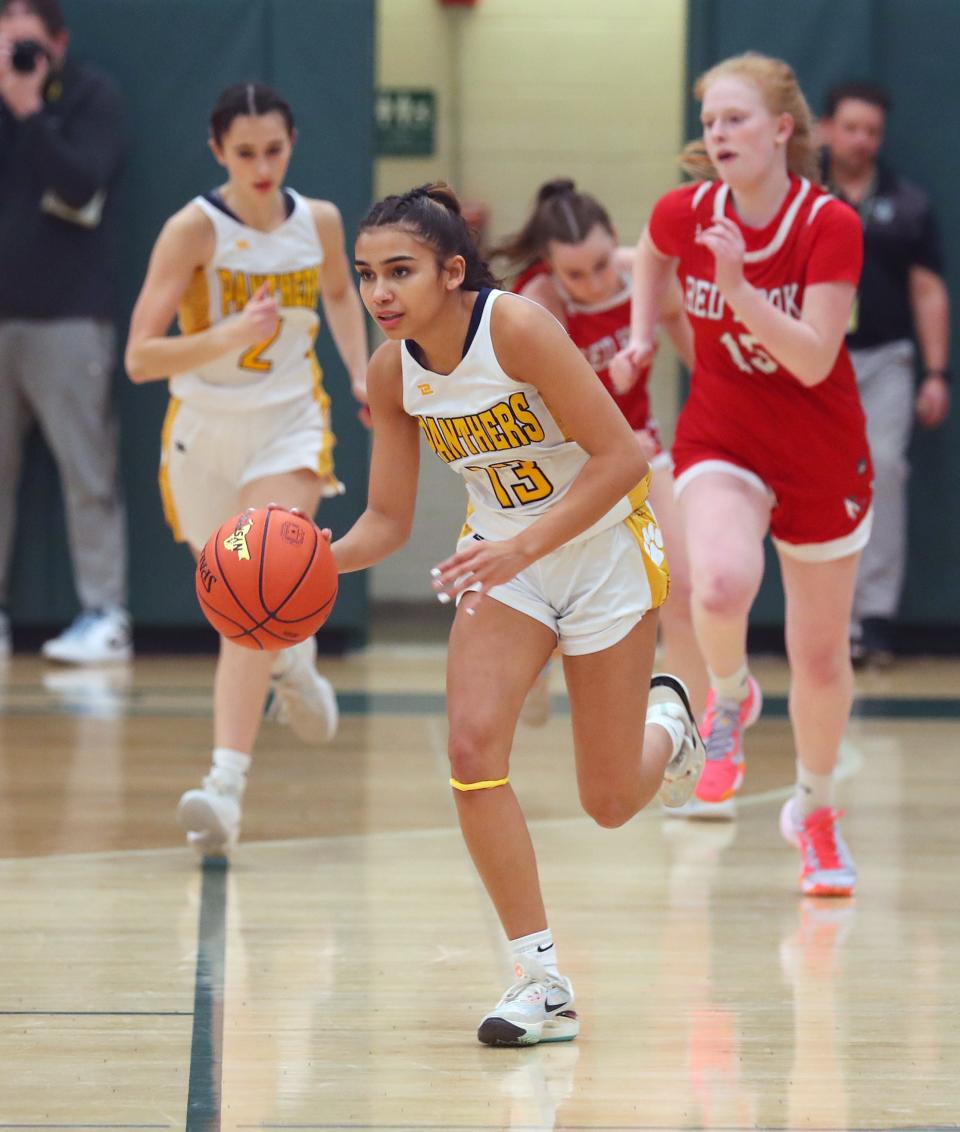 Panas' Sofia Tavarez (13) drives to the basket against Red Hook during the girls Class A regional semifinal at Yorktown High School March 5, 2024. Walter Panas won the game 63-30.