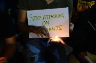 Candlelight protest against the attack on JNU students outside Gateway of India in Mumbai.