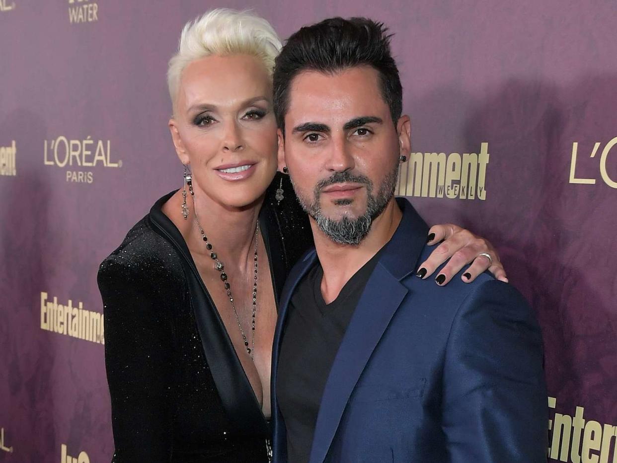 Brigitte Nielsen (L) and Mattia Dessi attend the 2018 Pre-Emmy Party hosted by Entertainment Weekly and L'Oreal Paris at Sunset Tower on September 15, 2018 in Los Angeles, California