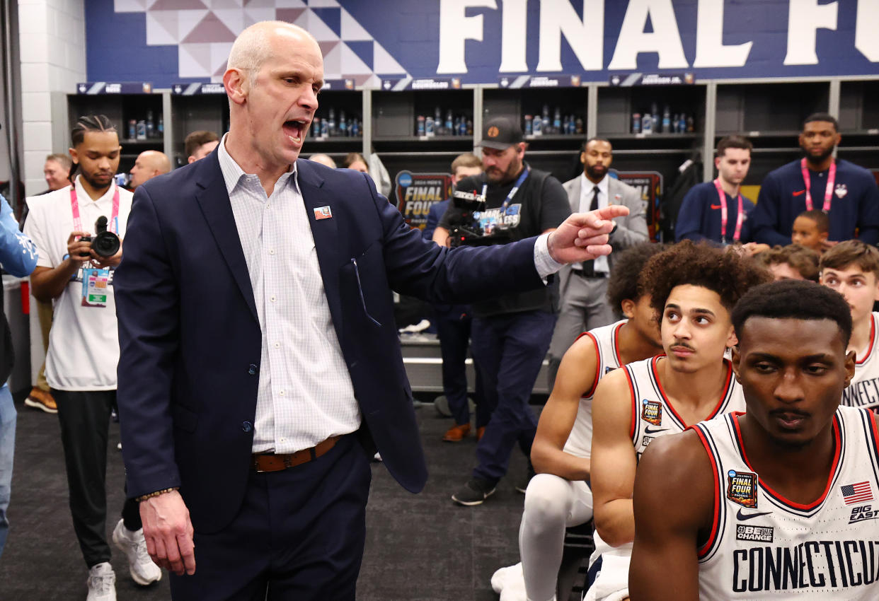 GLENDALE, ARIZONA - APRIL 06: Head coach Dan Hurley of the. Connecticut Huskies talks to team in locker room after defeating the Alabama Crimson Tide in the NCAA Men’s Basketball Tournament Final Four semifinal game at State Farm Stadium on April 06, 2024 in Glendale, Arizona. (Photo by Jamie Schwaberow/NCAA Photos via Getty Images)