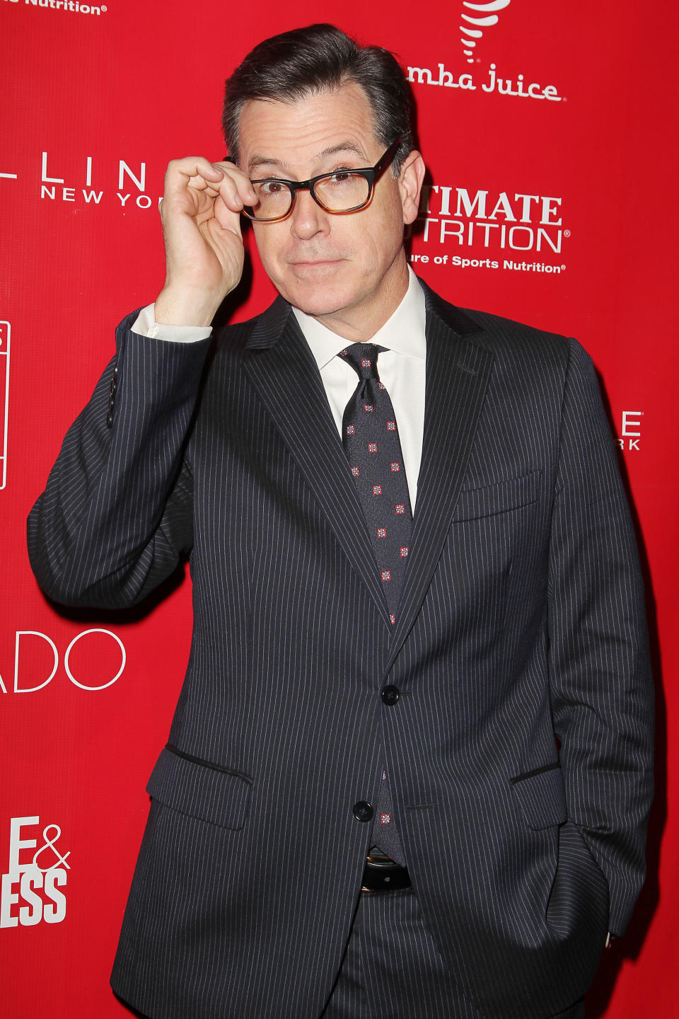 FILE - This Jan. 31, 2014 file image released by Starpix shows Stephen Colbert at the Shape Magazine and Men's Fitness Super Bowl Party in New York. Comedy Central deleted a message Thursday from the “Colbert Report” show Twitter feed showing a still from Wednesday night’s show where Colbert had joked about starting a “Ching-Chong Ding-Dong Foundation for Sensitivity to Orientals or Whatever.” It was part of a skit where Colbert had talked about the Washington Redskins owner buying things for Native Americans upset with the team’s name. (AP Photo/Starpix, Amanda Schwab, File)