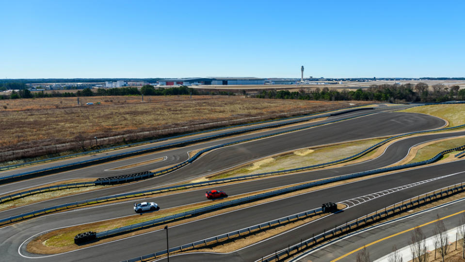 Porsche 911s on the new track expansion at the Porsche Experience Center Atlanta.